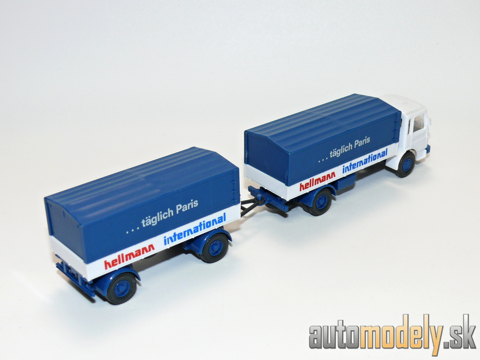 Wiking 424/6 - MAN 12.170 Pritschen-anhänger "Hellmann International" - HO 1:87